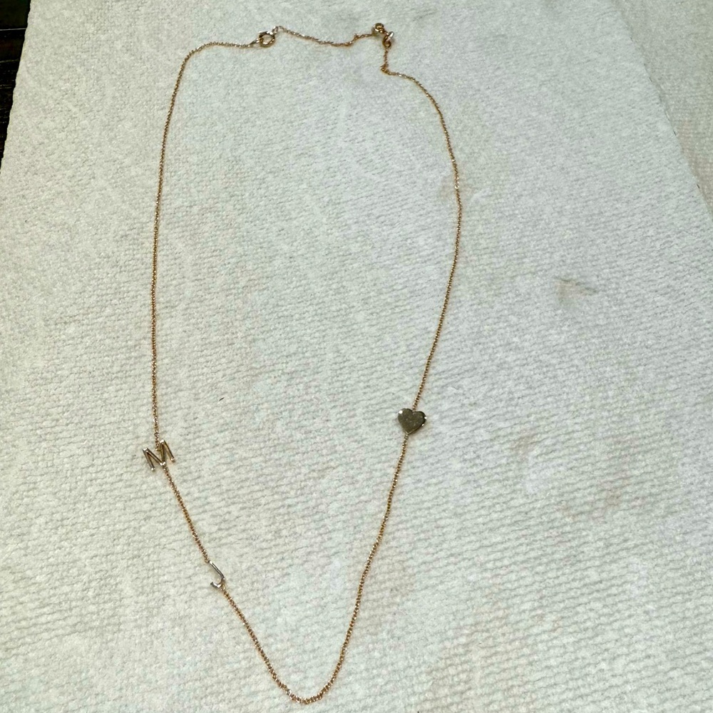 Maya Brenner rose gold necklace with M and J